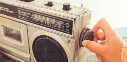 woman-s-hand-adjusting-button-vintage-radio_1484-1362-626x375